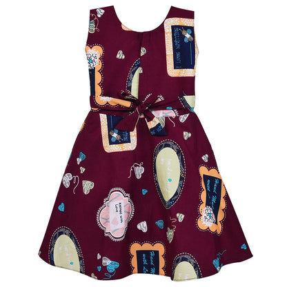 Girls Maroon Printed Cotton Dress with Asymmetrical Panel & Floral Accent ctn557