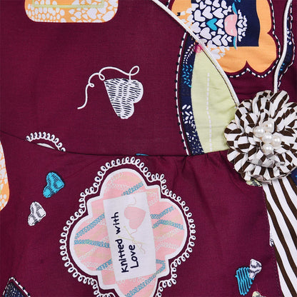 Girls Maroon Printed Cotton Dress with Asymmetrical Panel & Floral Accent ctn557